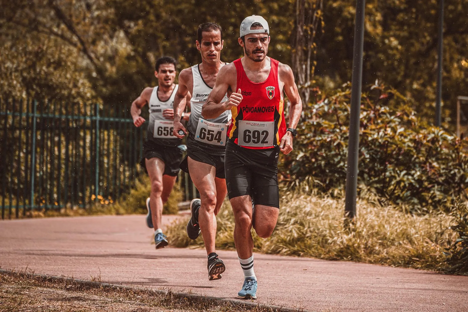 Amateur runner on a morning road run, training for a second daily workout session